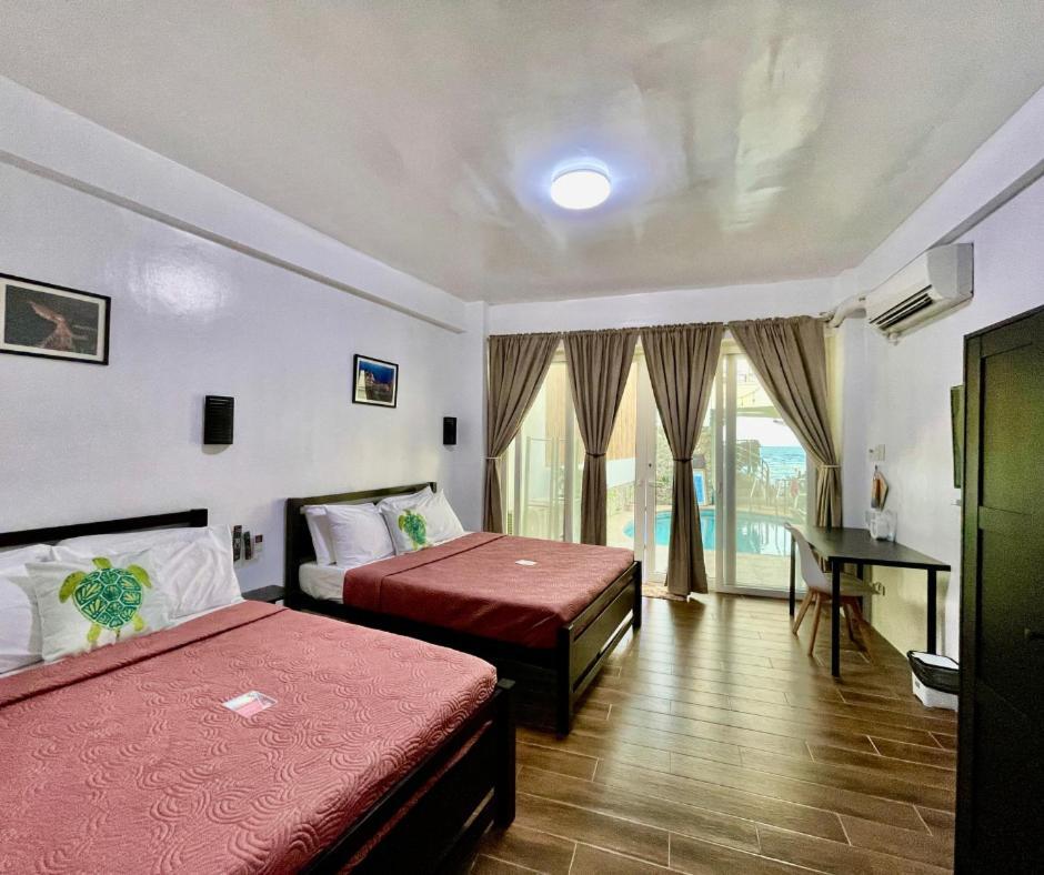 อาร์กิเปลาโก บีช รีสอร์ต Hotel ปูแอร์โตกาเลรา ภายนอก รูปภาพ