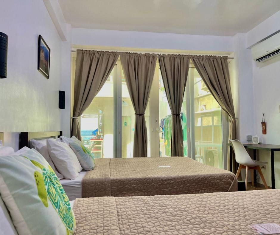อาร์กิเปลาโก บีช รีสอร์ต Hotel ปูแอร์โตกาเลรา ภายนอก รูปภาพ